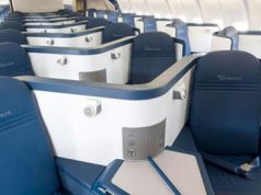 Delta completa instalación de asientos cama con acceso directo al pasillo en vuelos transoceánicos