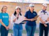 Voluntarios de Popular y Hábitat Dominicana mejoran viviendas y cancha deportiva en Yaguate